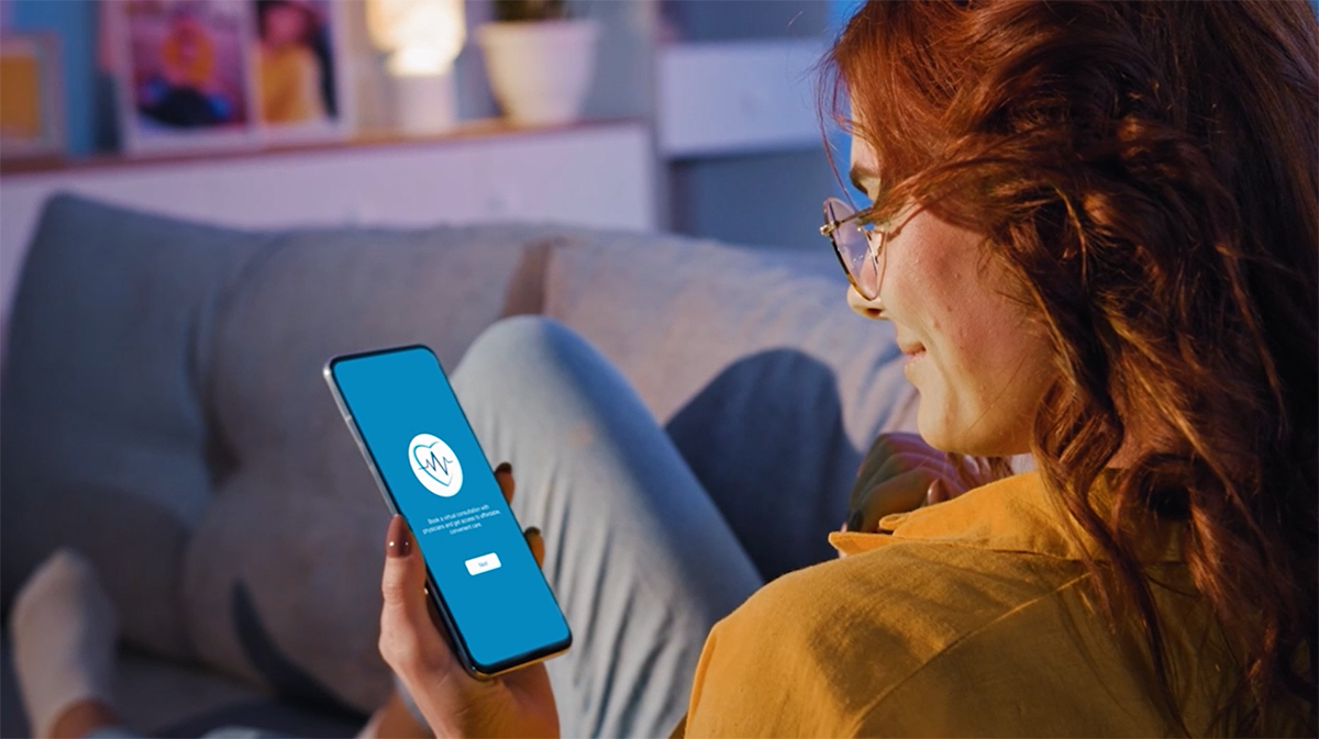Woman on a virtual doctor visit using her phone