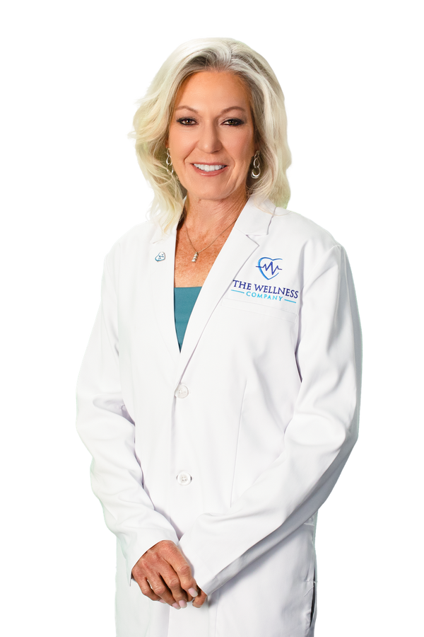 Dr. Kelly Victory in a white medical coat