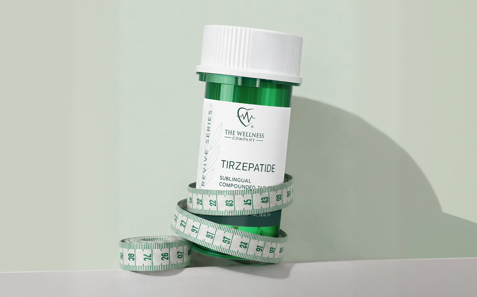 Tirzepatide sublingual tablets bottle wrapped in measuring tape